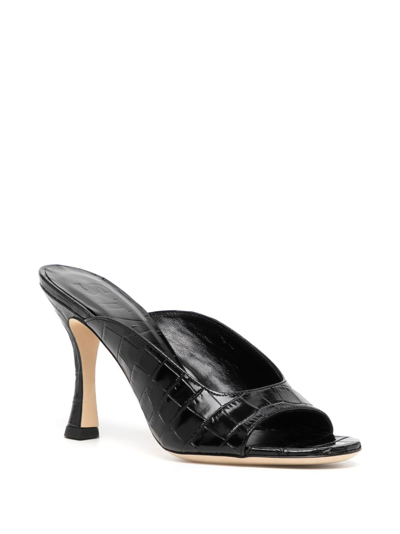 Shop Staud Sylvia 100mm Crocodile-effect Mules In Black