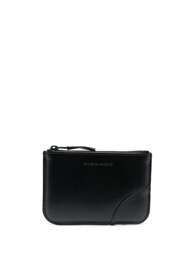 Shop Comme Des Garçons Logo-debossed Leather Pouch In Black