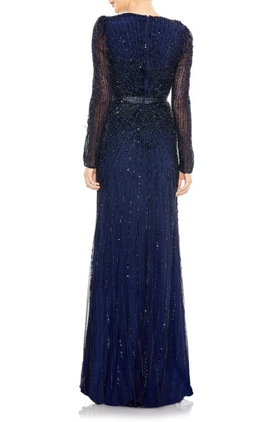 Shop Mac Duggal Sequin Long Sleeve Faux Wrap Gown In Midnight