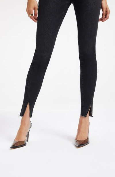 Shop Good American Good Legs Twisted Slit Hem Skinny Jeans In Black283