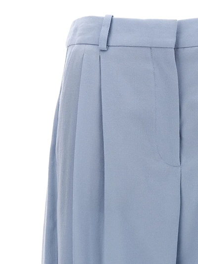 Shop Stella Mccartney Front Pleat Wool Pants In Light Blue