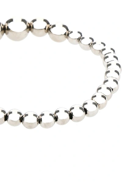 Alexander Mcqueen Skull Multi-bead Brass Bracelet In Silver
