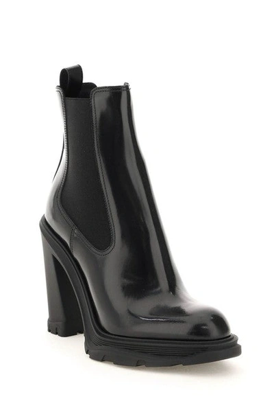 Shop Alexander Mcqueen Women Black Cheslea Tread Heeled Boots/booties