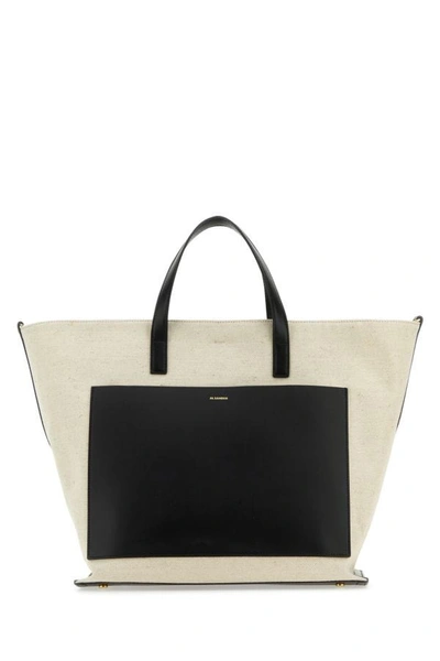 Shop Jil Sander Woman Two-tone Canvas And Leather Medium Wander Square Handbag In Multicolor