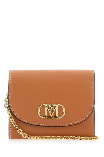 Shop Mcm Unisex Caramel Leather Mini Mode Travia Wallet In Brown