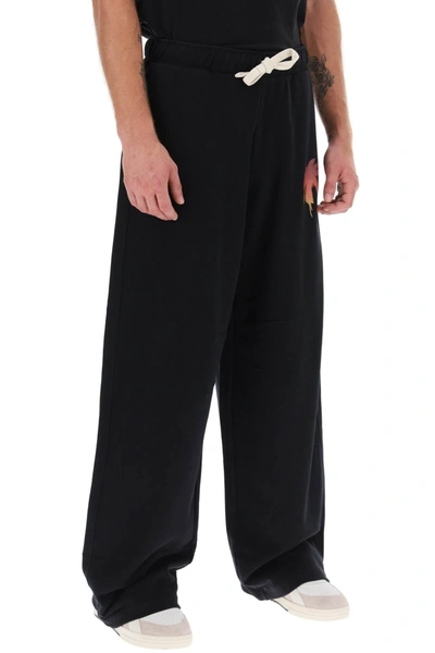 Shop Palm Angels Baggy Joggers Men In Black