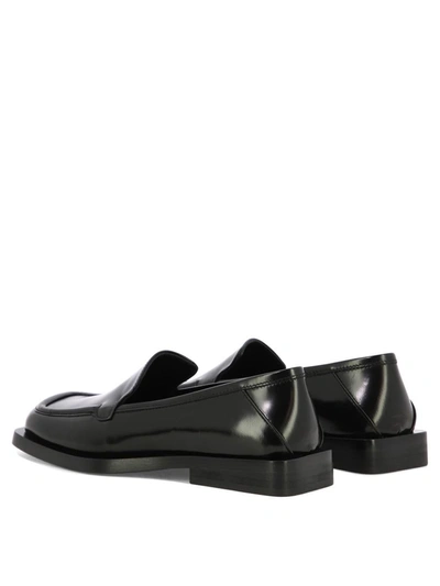 Attico Micol Asymmetric-toe Leather Loafers In Black