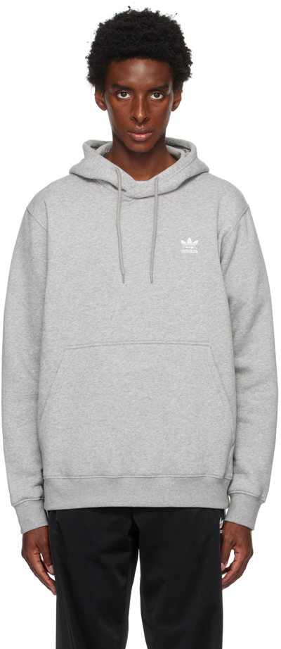 Shop Adidas Originals Gray Trefoil Essentials Hoodie In Medium Grey Heather