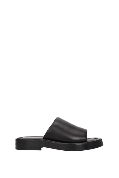 Shop Ferragamo Slippers And Clogs Leather Black