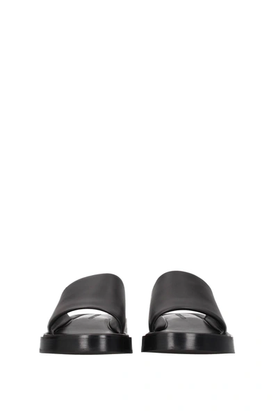 Shop Ferragamo Slippers And Clogs Leather Black
