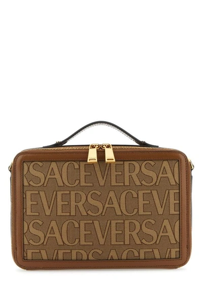 Shop Versace Man Embroidered Canvas  Allover Handbag In Multicolor