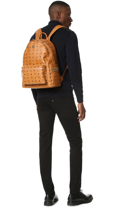 Shop Mcm Stark Medium Side Stud Backpack In Cognac