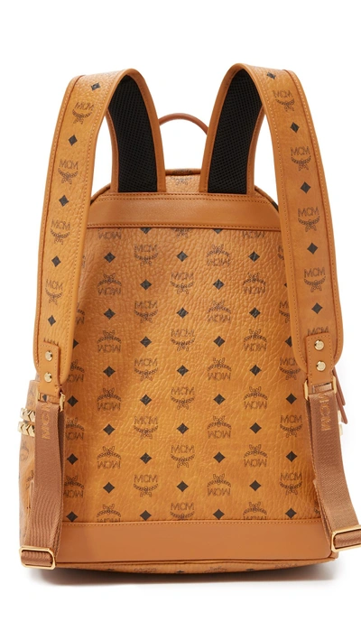 Shop Mcm Stark Medium Side Stud Backpack In Cognac