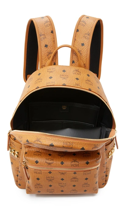 Shop Mcm Stark Medium Side Stud Backpack In Cognac