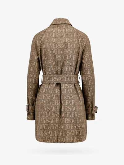 Shop Versace Woman Trench Woman Beige Trench Coats In Cream