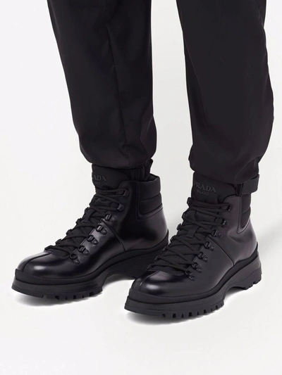 Shop Prada Brixxen Ankle-length Boots In Nero