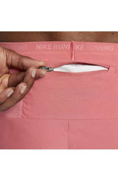 Shop Nike Dri-fit Stride 5-inch Running Shorts In Adobe/ Red Stardust