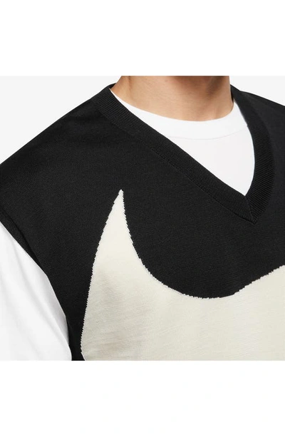 Shop Nike Swoosh Graphic Sweater Vest In Black/ Coconut Milk