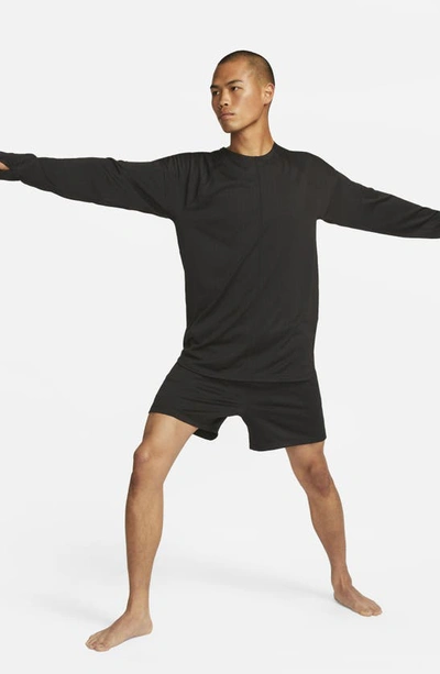 Shop Nike Dri-fit Long Sleeve Yoga Top In Black/ Black