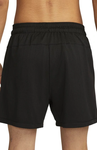 Shop Nike Yoga Dri-fit Jersey Shorts In Black/ Black