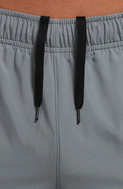 Shop Nike Dri-fit Tapered Versatile Pants In Smoke Grey/ Black/ Silver
