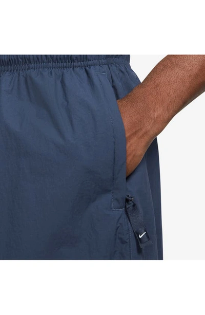 Shop Nike Solo Swoosh Water Repellent Nylon Shorts In Midnight Navy/ White
