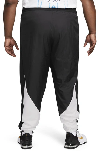 Shop Nike Starting 5 Joggers In Black/ White/ Black/ White