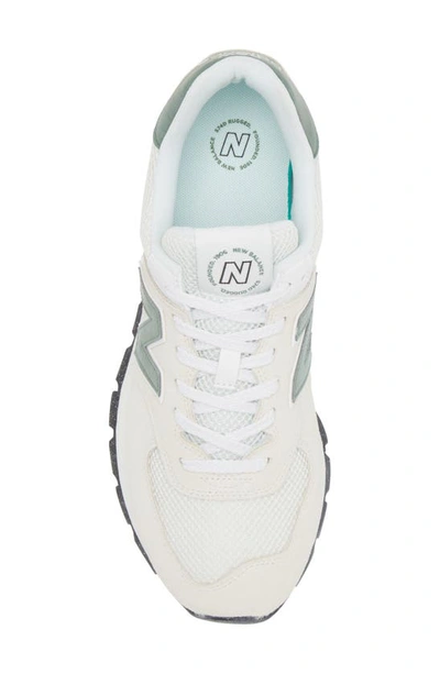 Shop New Balance Gender Inclusive 574 Rugged Sneaker In Reflection/ Green