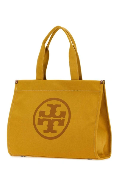 Shop Tory Burch Handbags. In Yellow