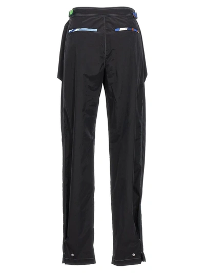 Shop Emilio Pucci Pucci Logo Nylon Pants In Black