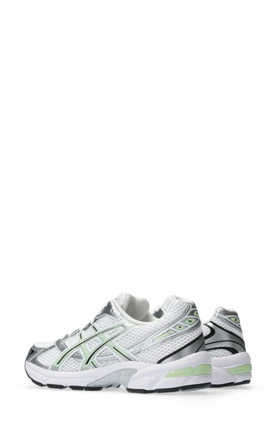 Shop Asics Gel-1130™ Running Shoe In White/ Jade