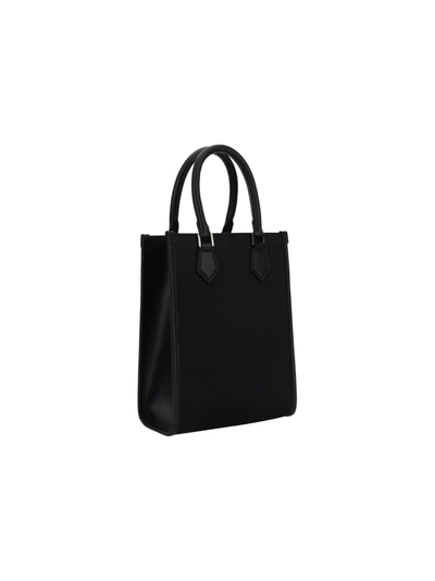 Shop Dolce & Gabbana Nylon And Leather Handbag With Embossed Logo