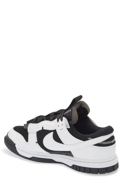 Shop Nike Dunk Low Remastered Sneaker In Black/ White
