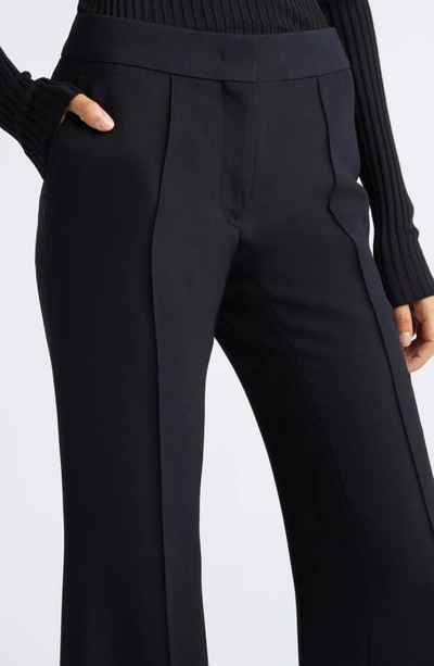 Shop Jil Sander Tailored Pintuck Flared Pants In 001-black