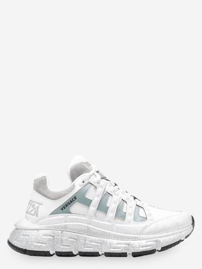 Shop Versace Leather Sneakers In White