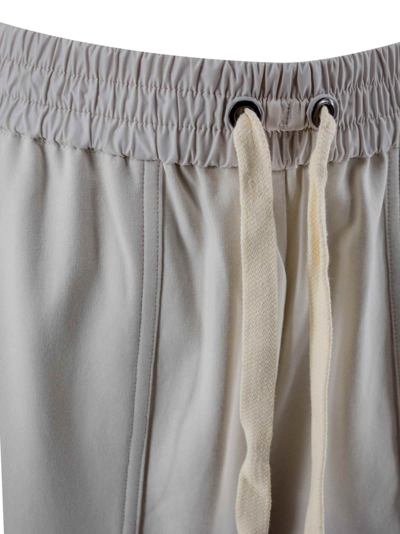 Shop Brunello Cucinelli Cotton Trousers In Beige