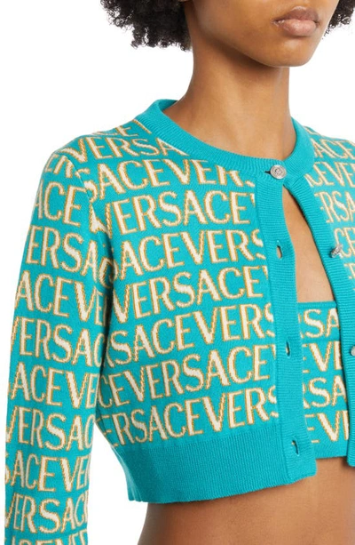 Shop Versace Metallic Logo Cotton Blend Crop Cardigan In Turquoise Light Blue