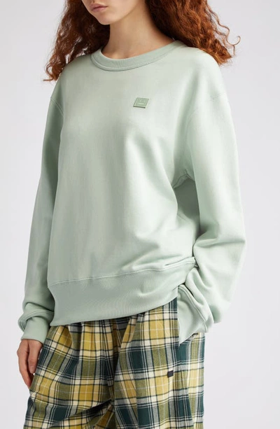 Shop Acne Studios Fairah Face Patch Oversize Cotton Sweatshirt In Soft Green