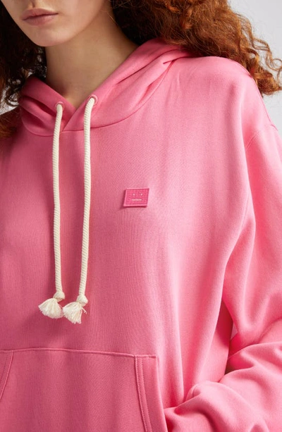 Shop Acne Studios Fairah Face Patch Oversize Cotton Hoodie In Bright Pink