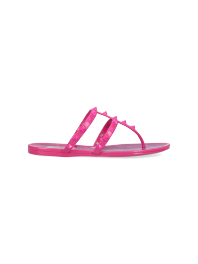 Shop Valentino Rockstud Thong Sandals In Pink