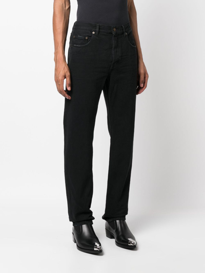 Shop Saint Laurent Slim-cut Cotton Jeans In Schwarz