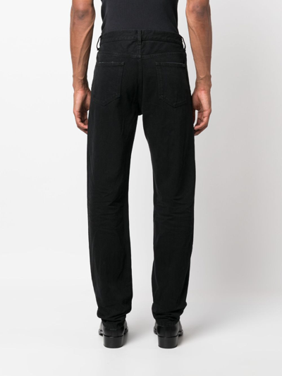 Shop Saint Laurent Slim-cut Cotton Jeans In Schwarz