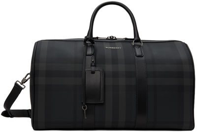 Shop Burberry Black Faux-leather Duffle Bag In Vrai