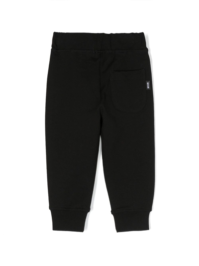 Shop Msgm Logo-print Jersey Track Pants In Black