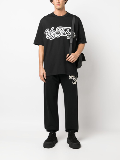 Y-3 Graphic Print Track Pants For Men And Women In Black