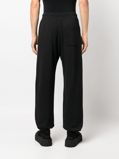 Y-3 Graphic Print Track Pants For Men And Women In Black