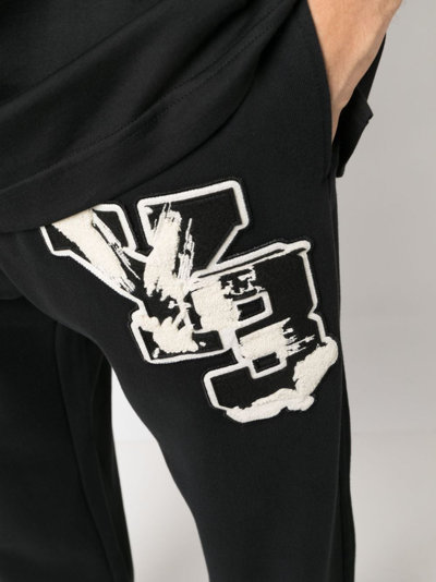 Y-3 Graphic Print Track Pants For Men And Women In Black