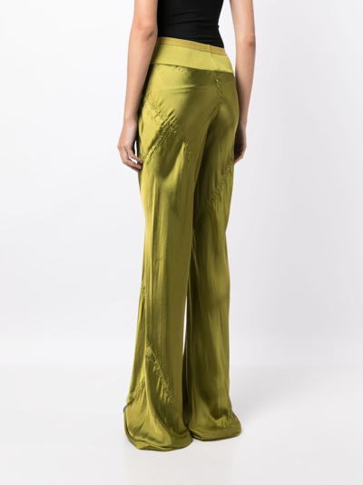 Shop Rick Owens Panelled Satin-finish Flared Trousers In Green