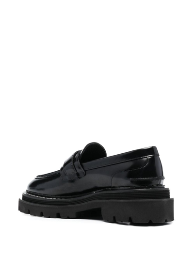Shop Sandro Buckle-embellished Leather Loafers In Black