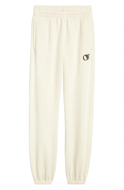 Shop Off-white Flocked Logo Cotton Joggers In Ivory Black